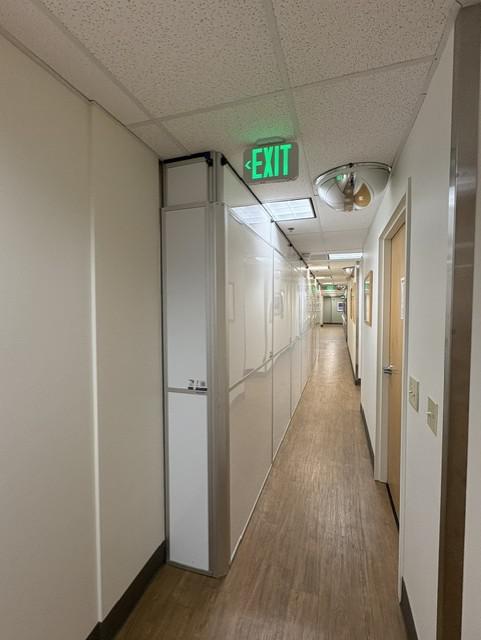 Modular ICRA wall fitted along a narrow healthcare corridor to isolate the renovation area.