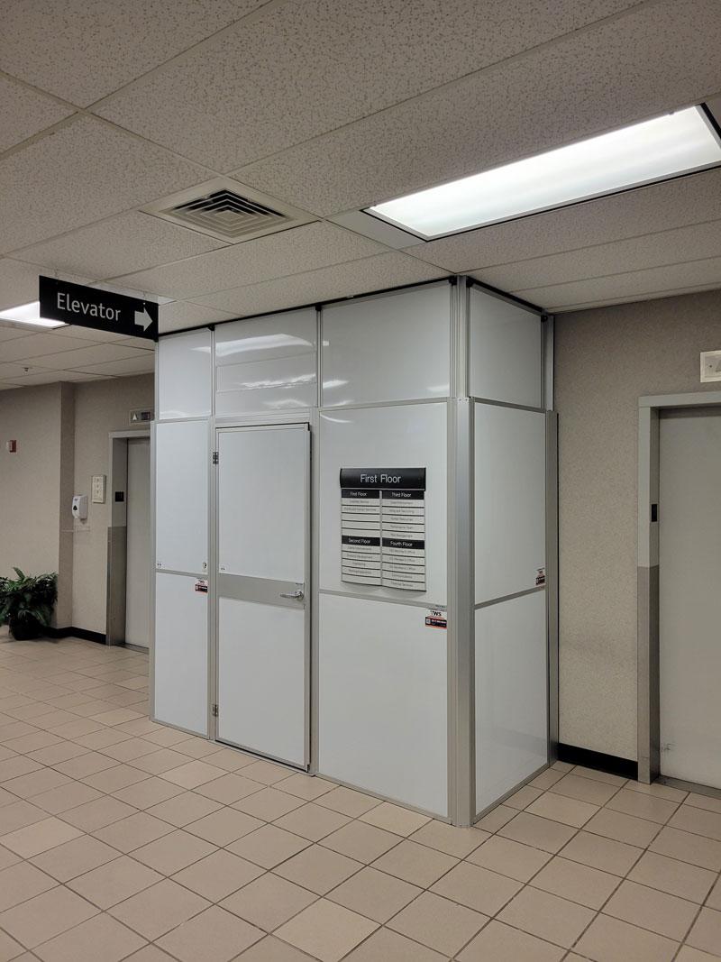 white temporary wall elevator