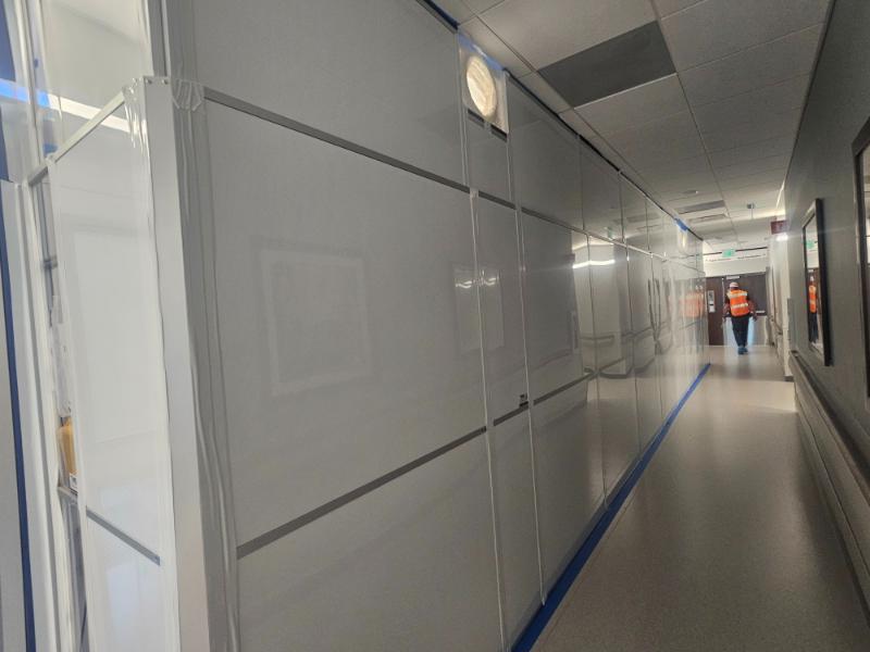 closer view of hallway white wall