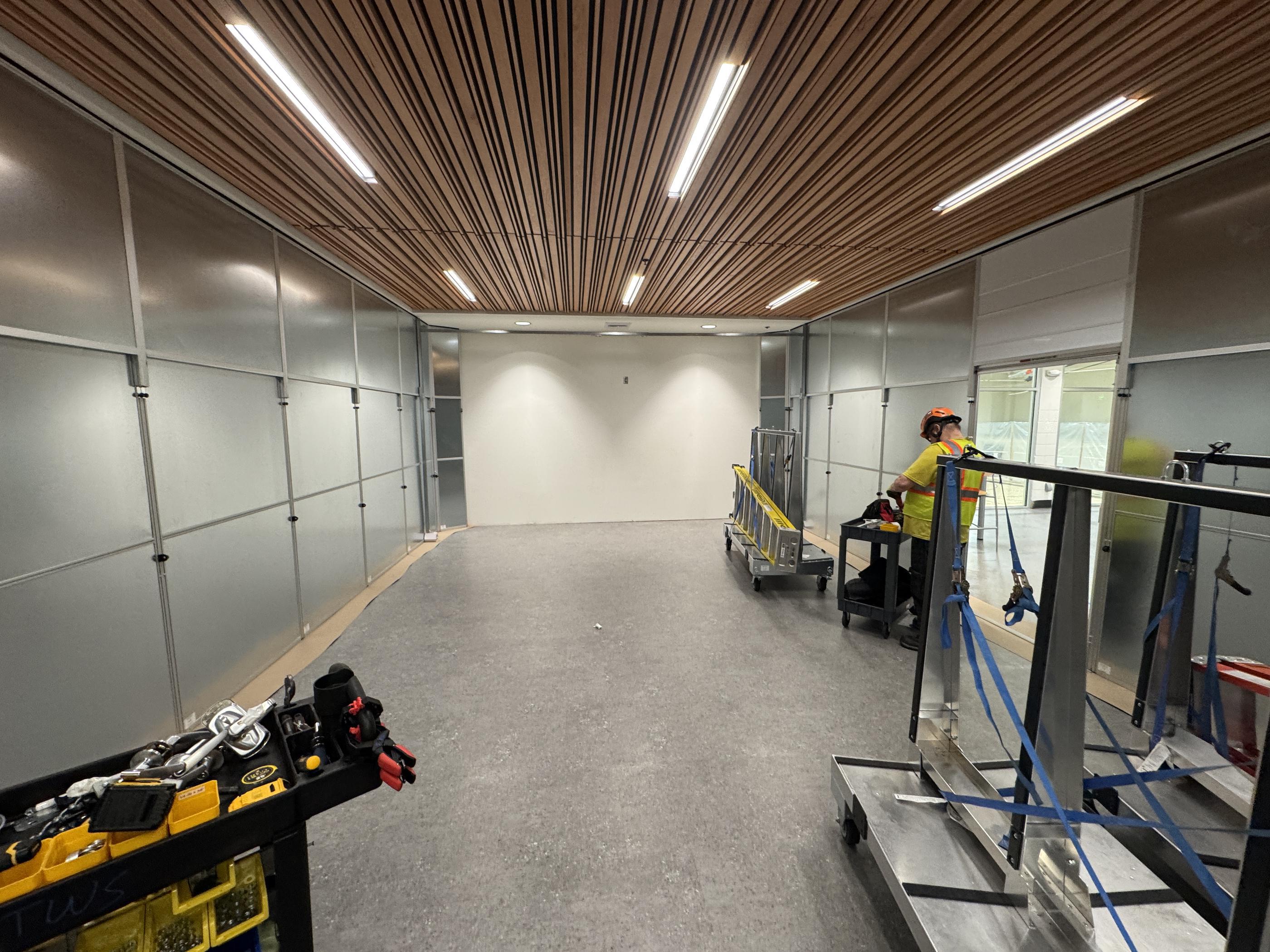 Clean fitness facility entrance area after containment removal and project completion in Salem, Oregon