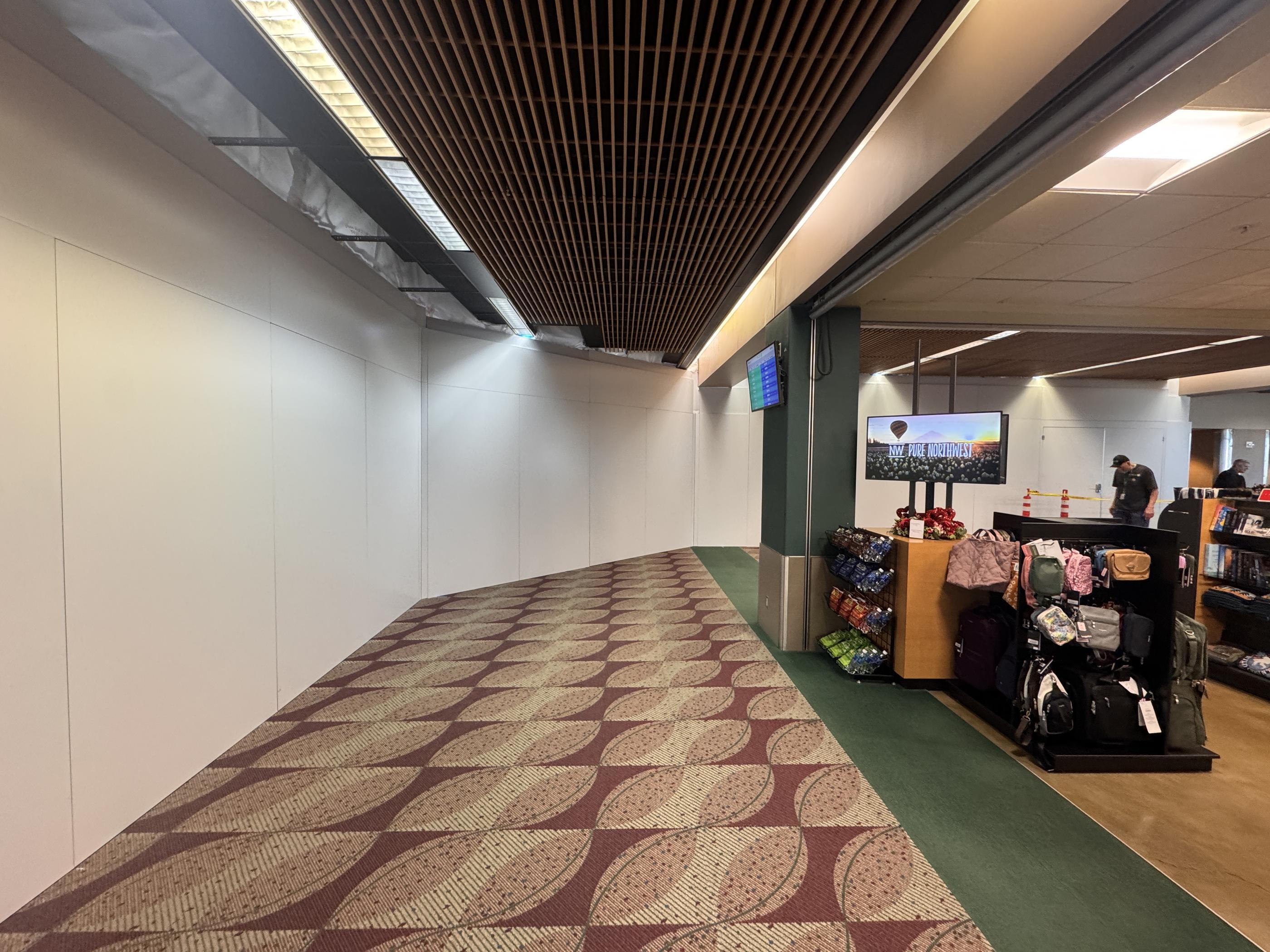 Temporary Wall Systems containment walls installed overnight at Eugene Airport renovation project