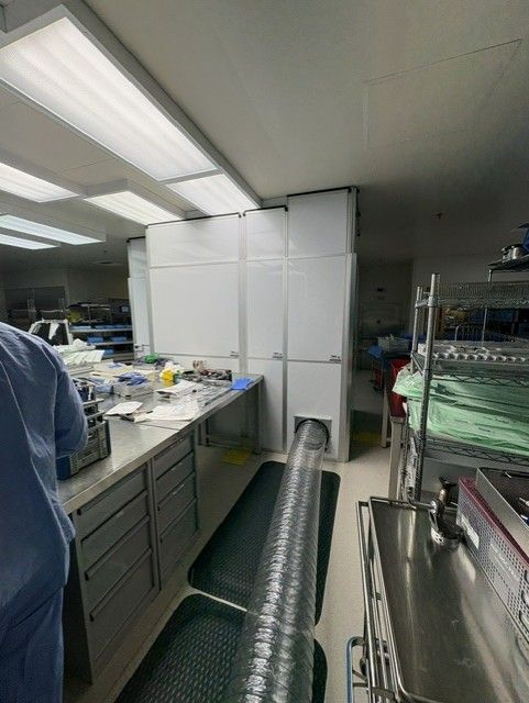 Temporary Wall Systems healthcare containment with extended venting and negative air setup supporting sterile processing lab infrastructure renovation