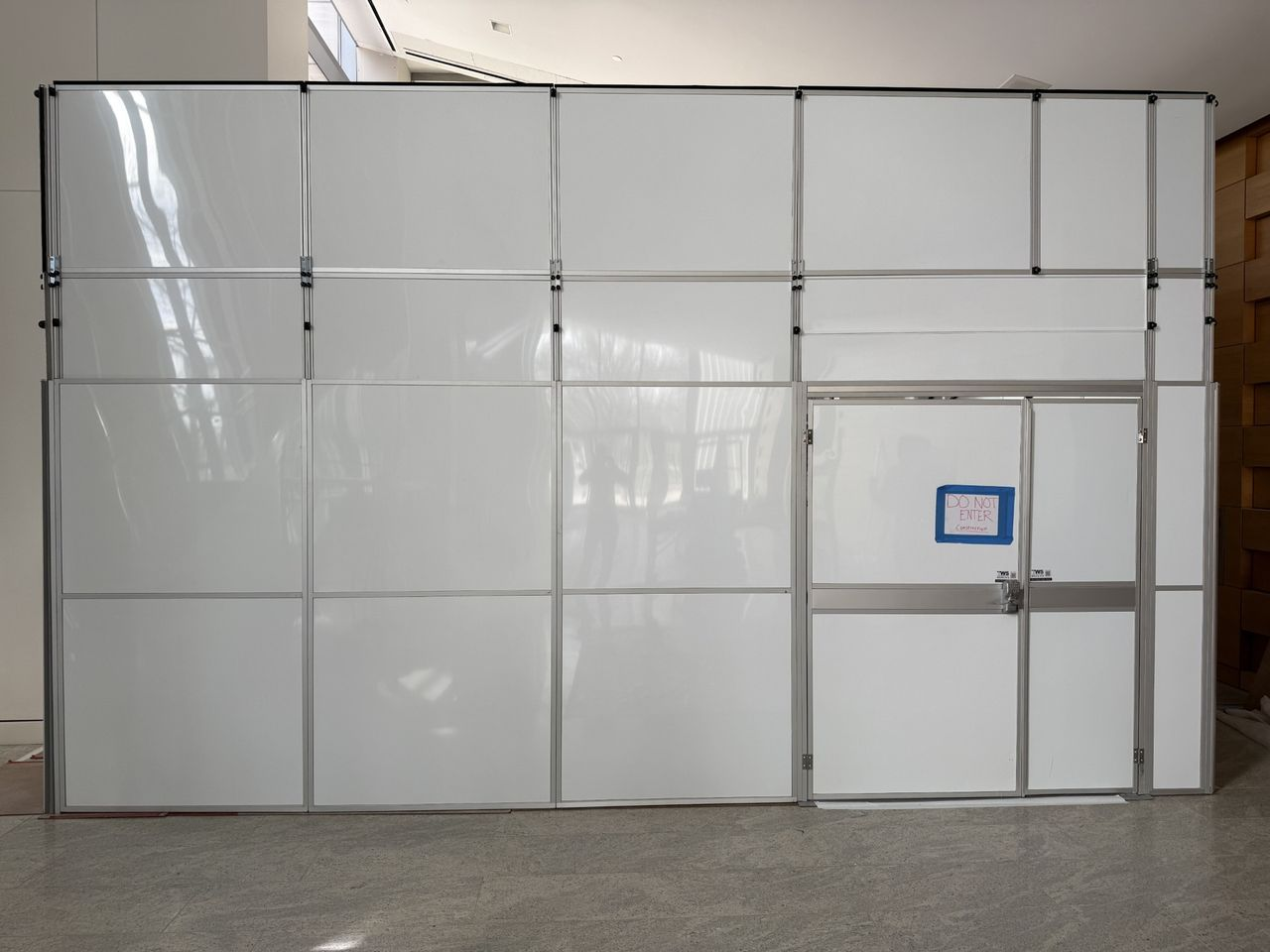 13-foot freestanding temporary walls installed by Temporary Wall Systems inside an occupied Oklahoma City event venue renovation