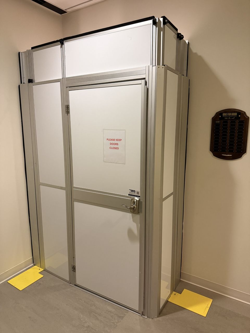 Temporary Construction Walls Secure Stairwell Access During Occupied Office Building Renovation