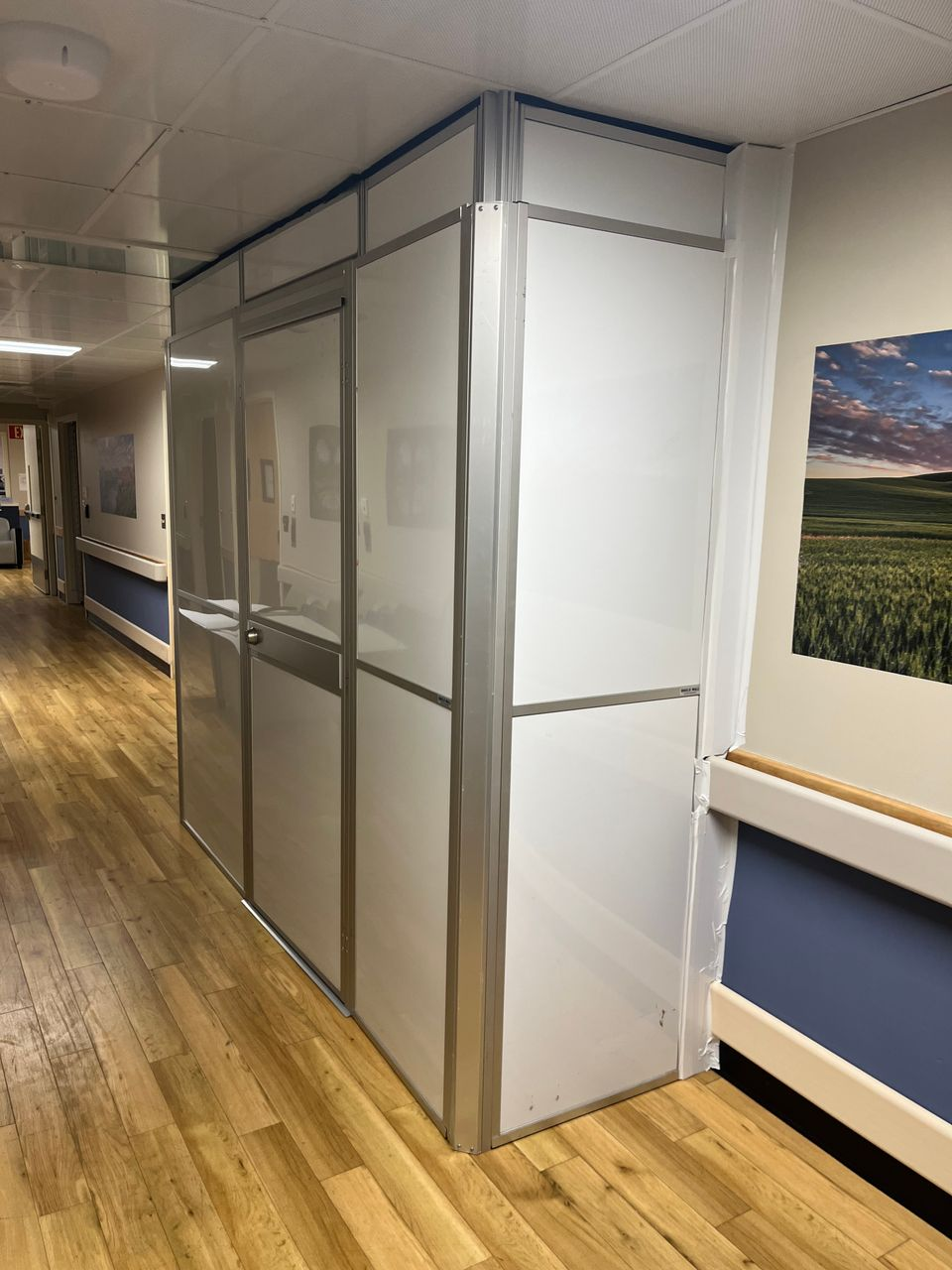 Reinforced Temporary Containment Supports Patient Room Door Replacement