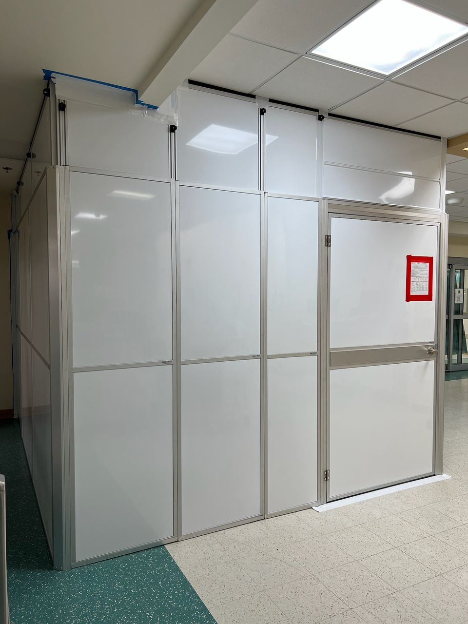 Temporary Wall Systems modular hard wall containment installed inside an active healthcare facility for emergency department construction containment and infection control.