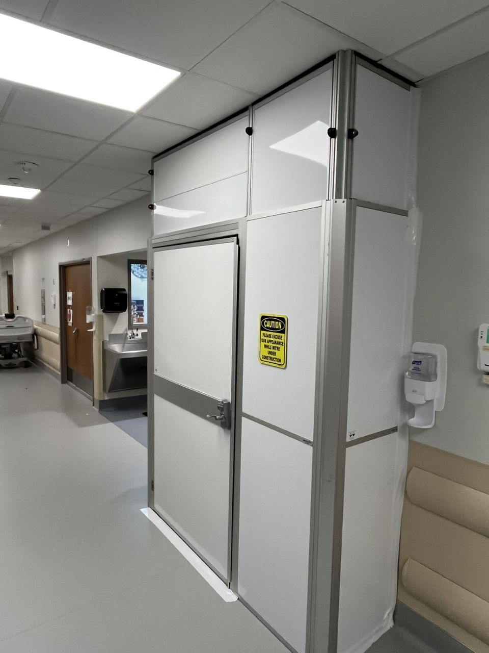 Healthcare construction containment system by Temporary Wall Systems separating operating room renovation work from occupied patient care areas.