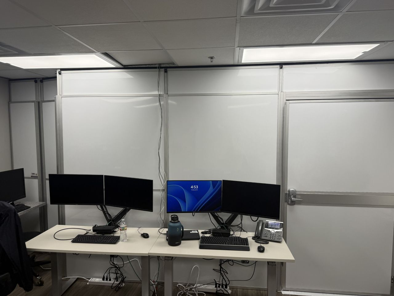 Healthcare construction containment using modular hard wall panels to support operational continuity during surveillance office renovation.
