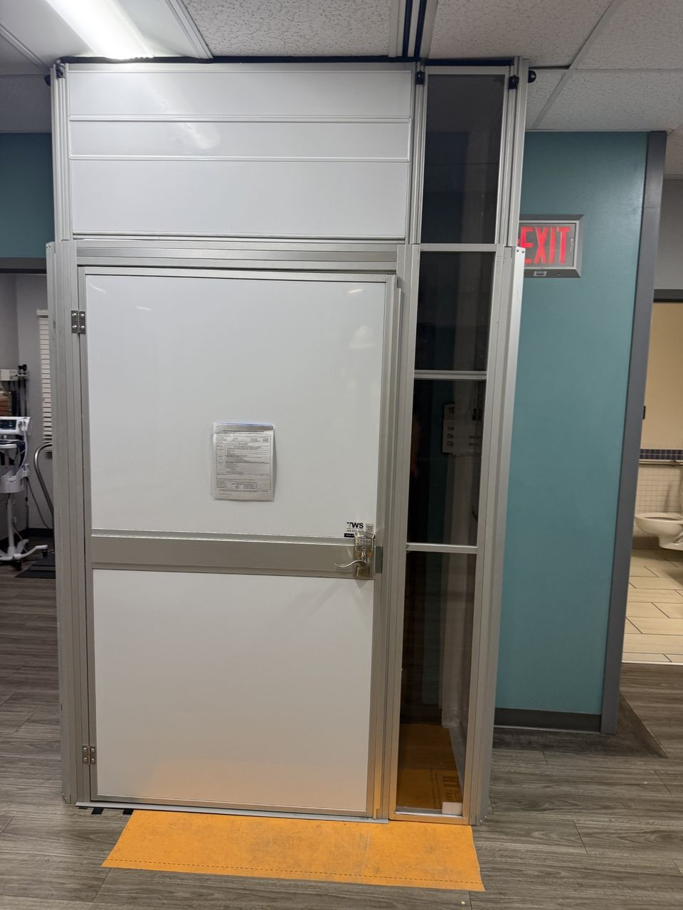 ICRA anteroom with controlled access door installed at a VA medical center to support infection control during an active healthcare renovation.