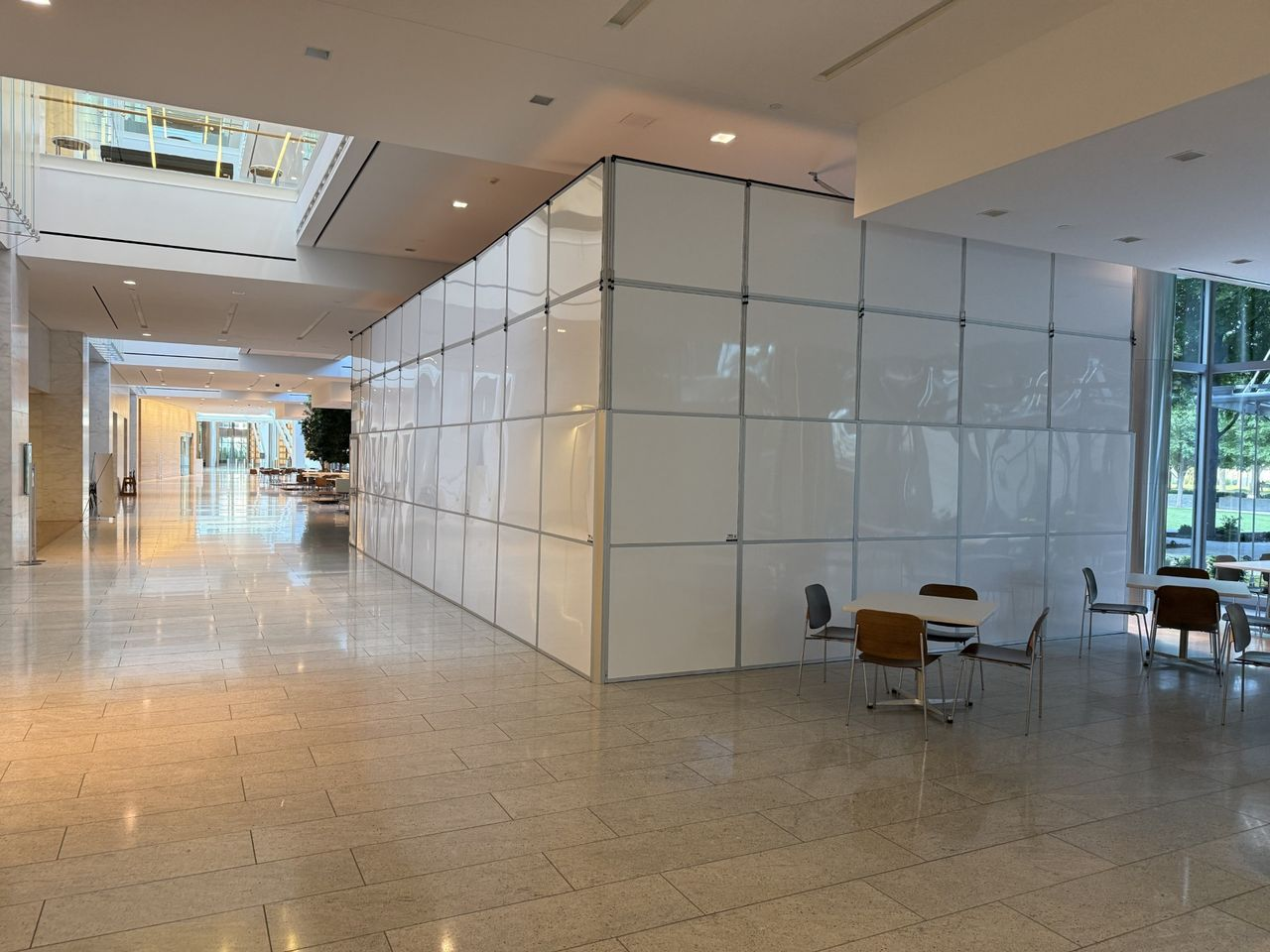 Temporary Wall Systems construction containment surrounding active restoration work while maintaining a professional appearance in an occupied office environment.