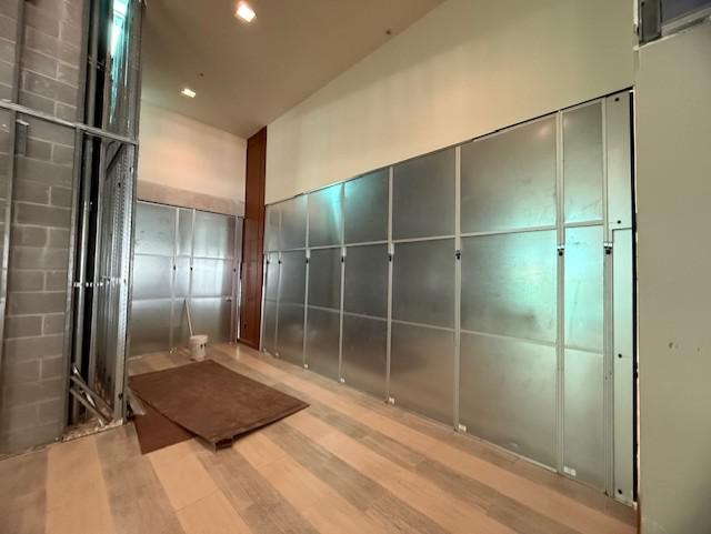 Temporary construction walls installed in multiple sections of The Baylor Club during an active stadium event