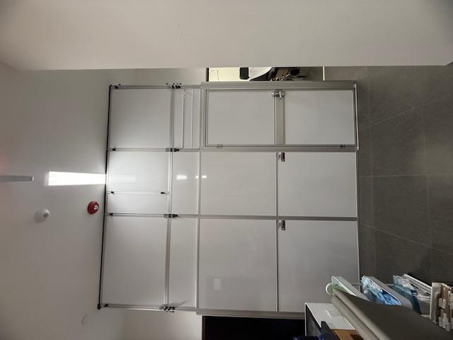 Temporary construction walls supporting an active medical office renovation in Cedar Park, Texas