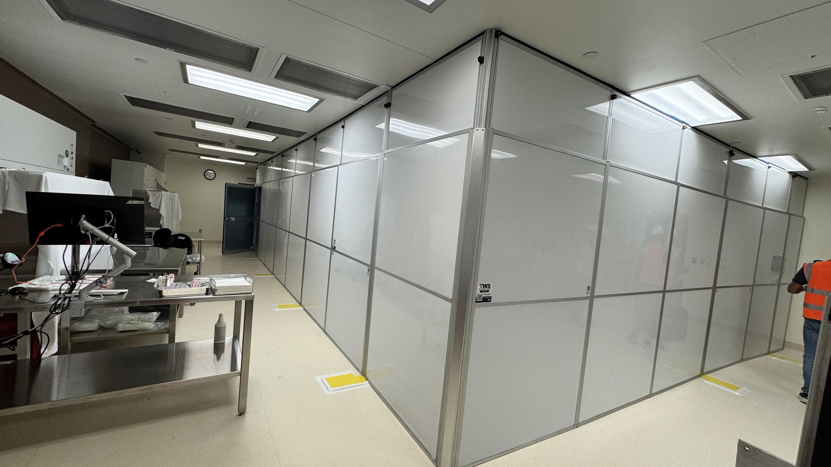 Temporary containment wall extended on site to accommodate existing steel counter