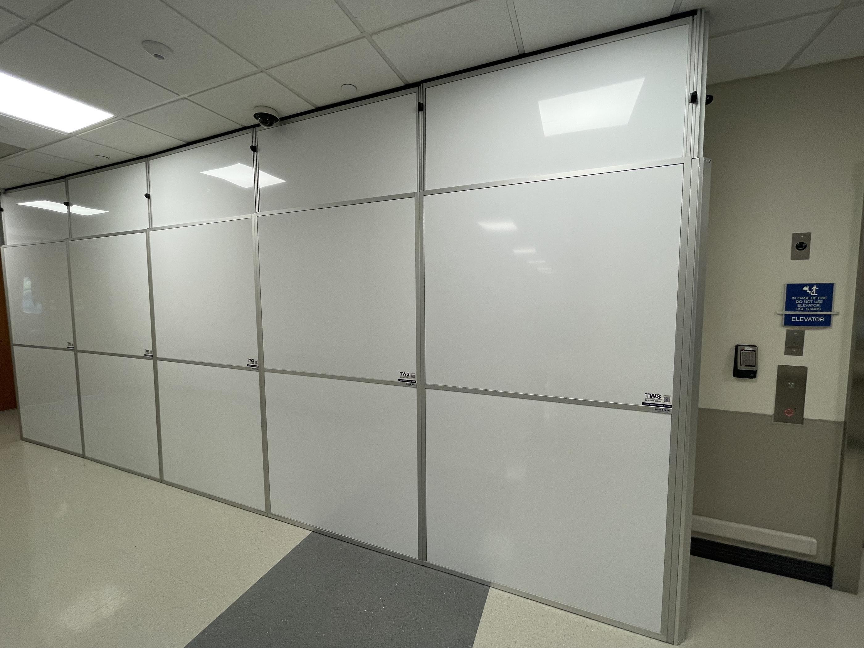 Healthcare renovation containment with over 250 linear feet of temporary wall systems installed for Phase 1 construction.