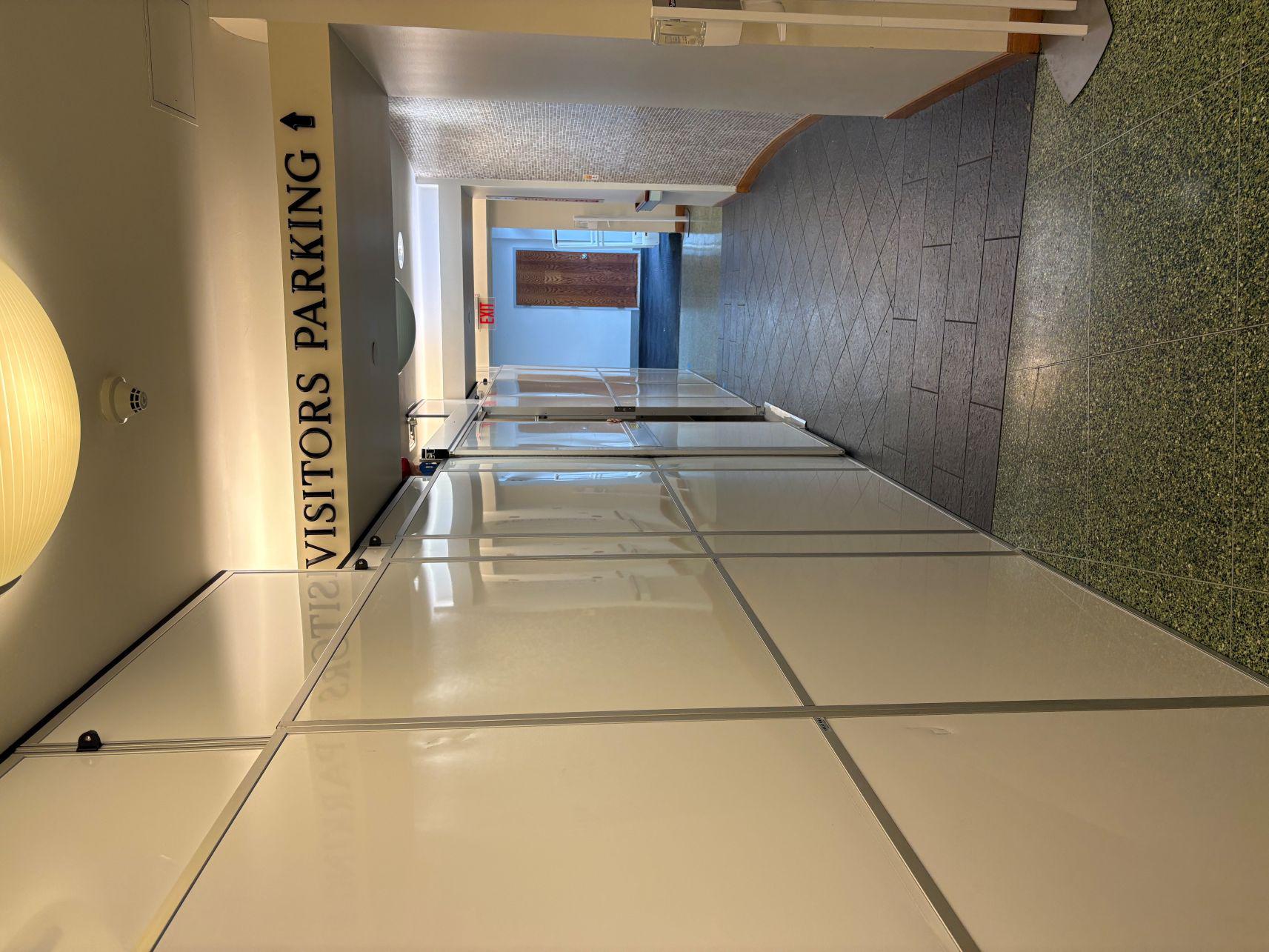 Temporary Wall Systems with Sliding Door and Air Scrubber Support for Complex Renovation Projects