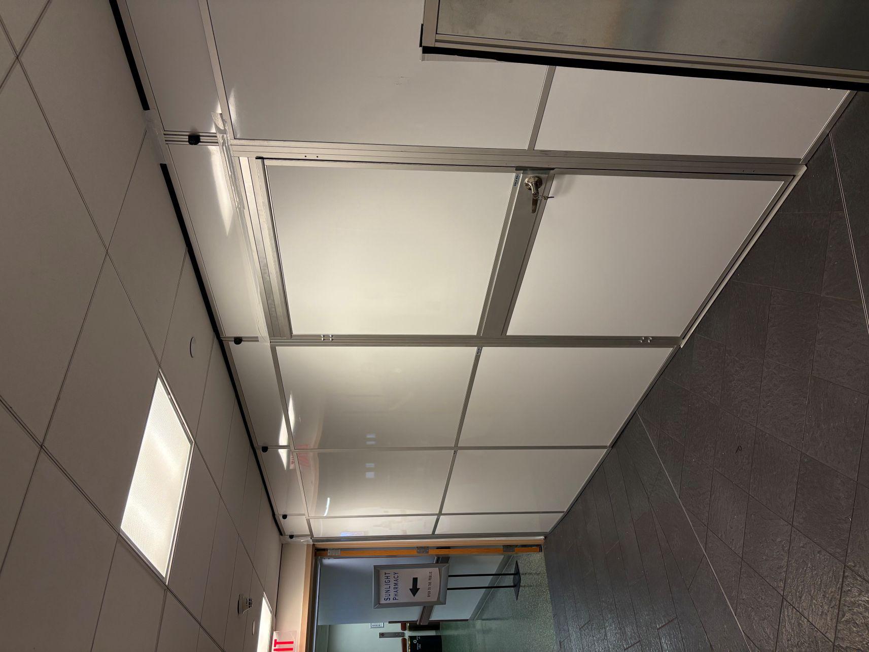 Temporary Wall Systems with Sliding Door and Air Scrubber Support for Complex Renovation Projects