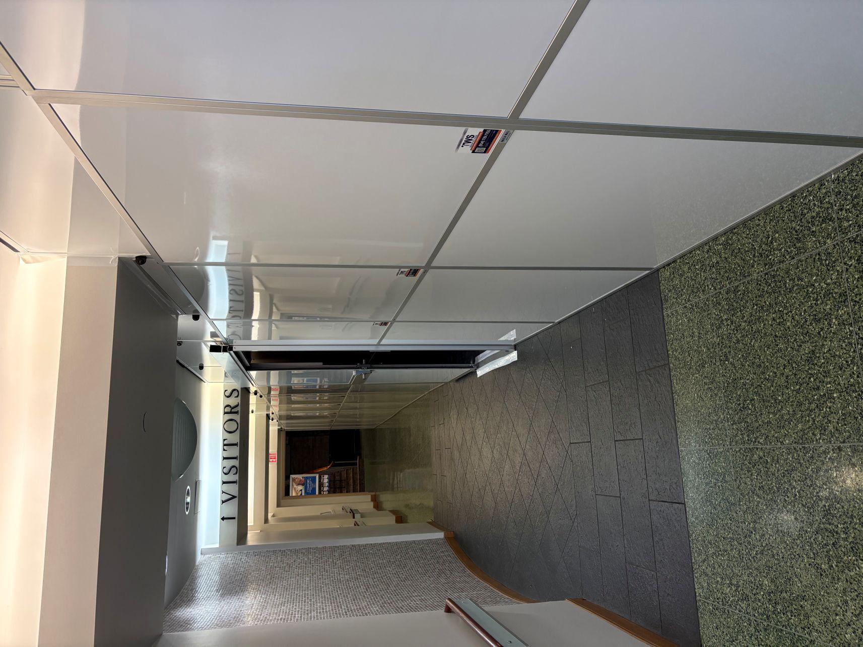 Temporary Wall Systems with Sliding Door and Air Scrubber Support for Complex Renovation Projects