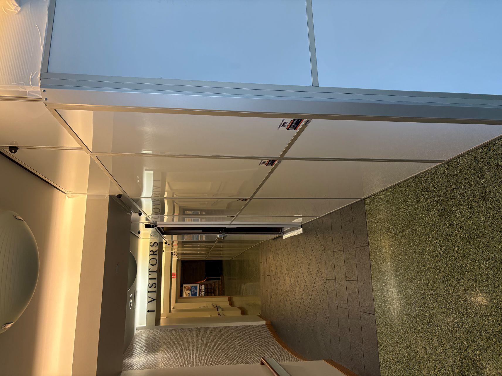 Temporary Wall Systems with Sliding Door and Air Scrubber Support for Complex Renovation Projects