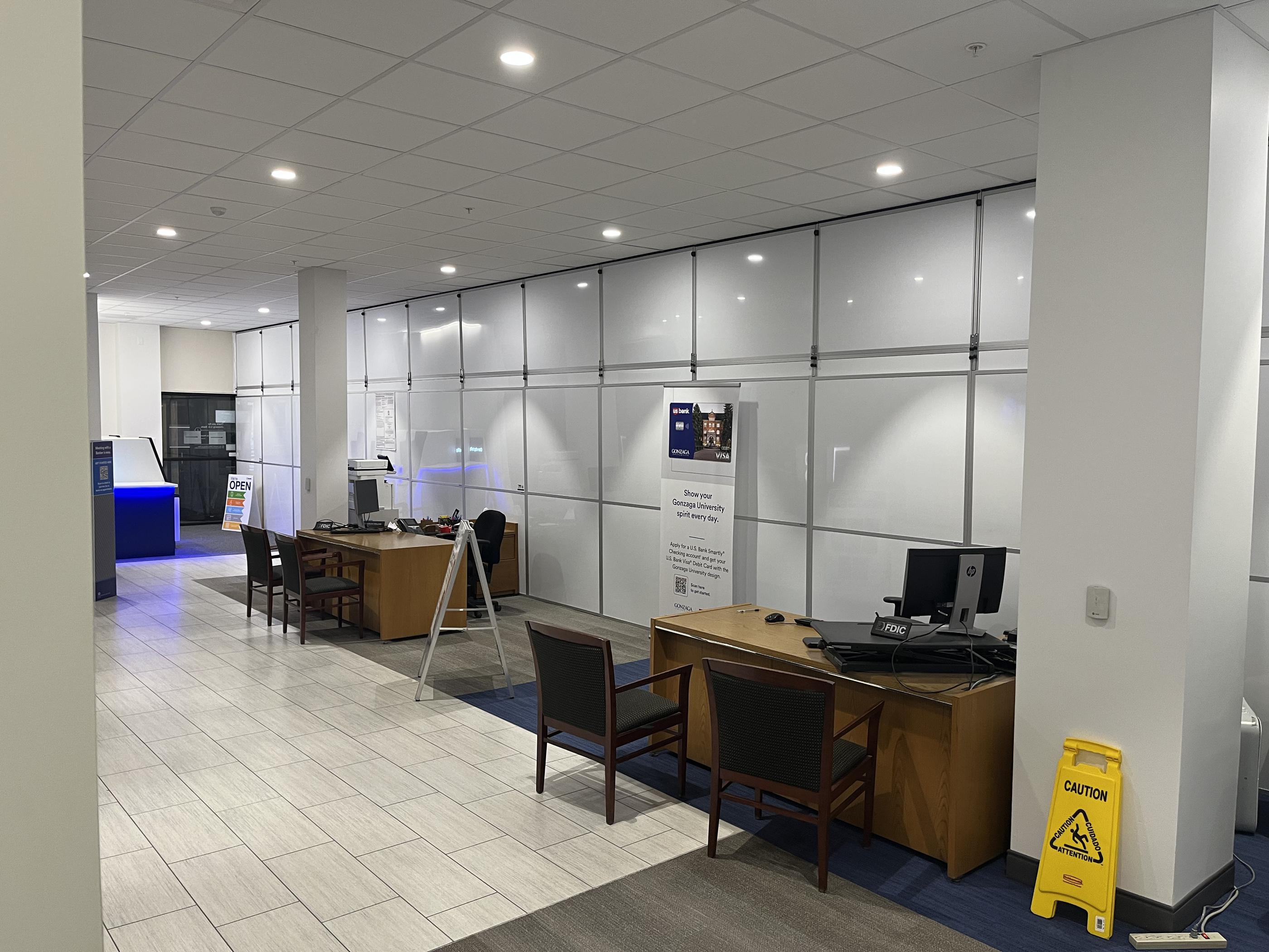 Occupied renovation containment in bank - Temporary Wall Systems Spokane