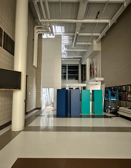 32-foot Connect Wall installation by Temporary Wall Systems creating secure construction containment inside a school during a hallway expansion project.