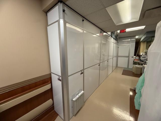 Hard wall containment supporting emergency restoration work inside an active hospital in Austin, Texas