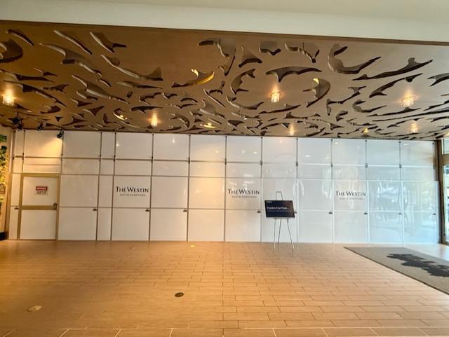 Temporary construction walls in active hotel lobby during renovation in Austin, TX