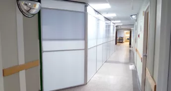 Hallway of a hospital using Temporary Wall Systems modular walls.