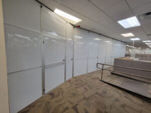 temporary walls in a hospital setting with brown carpet